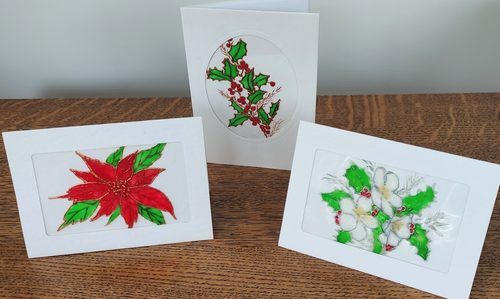 Chris D, Christmas cards, glass paints on acetate.